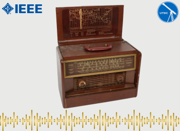 Shortwave radio contained in a brown leather-covered wooden suitcase-like case